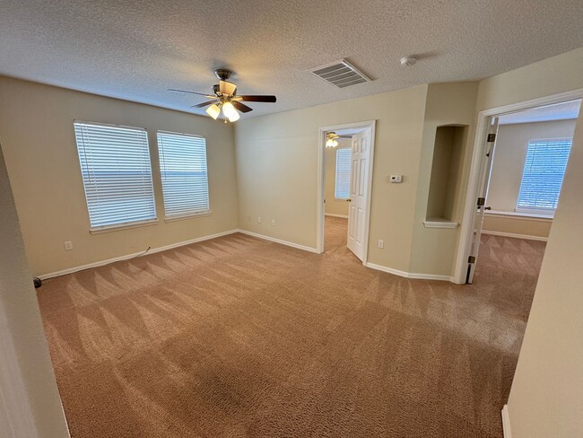 Building Photo - Spacious 4-Bedroom Home with Private Pool and Modern Comforts