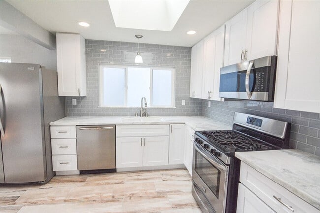 Building Photo - Updated Coastal Home with Studio Unit & Solar in Ocean Beach