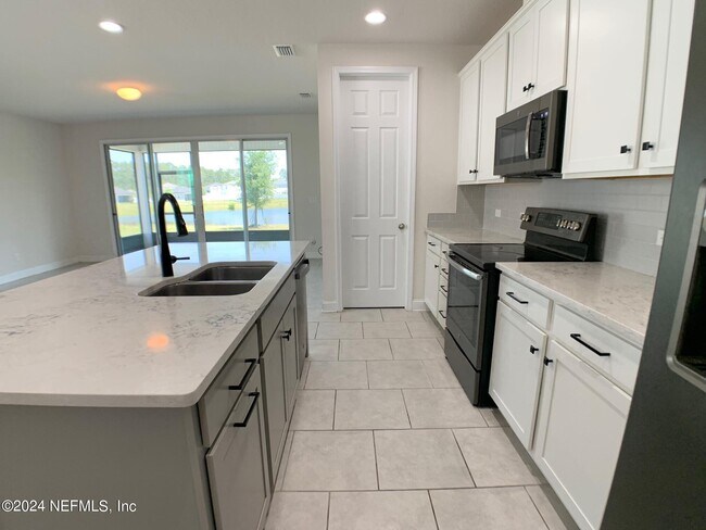 Building Photo - 1499 Tropical Pine Cove