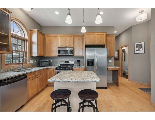 Wonderful kitchen island! Maple cabinets - 3125 Inglewood Ave S