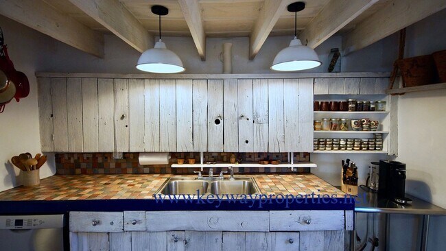 Building Photo - Classic New Mexican Adobe Retreat in the Heart of Los Ranchos