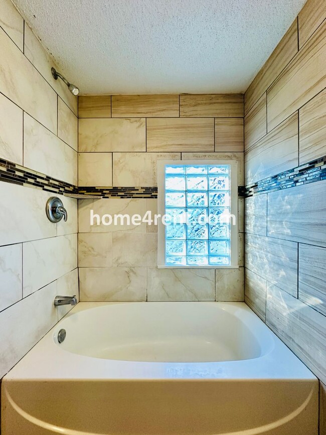 Building Photo - Adorable Home Featuring Wood Floors, SS Ap...