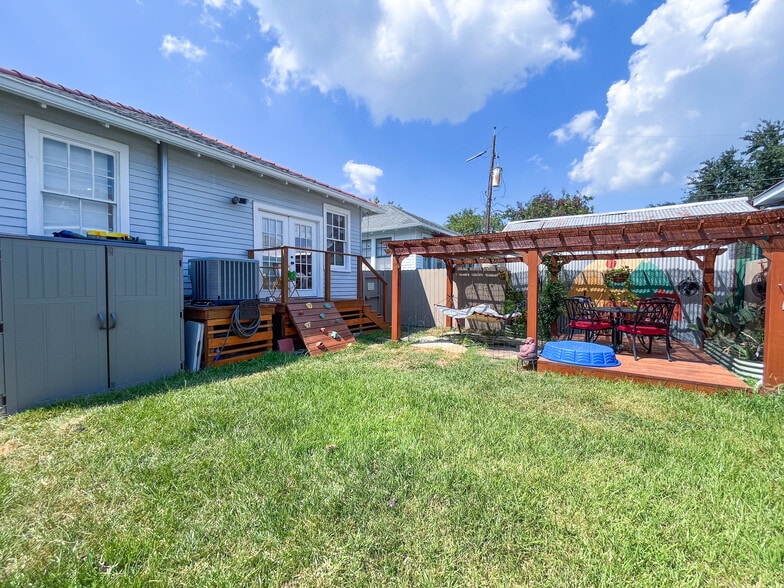 Backyard, shed stays with property - 3033 Robert St