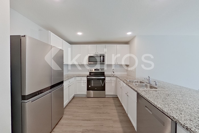 Building Photo - 8590 SW 44th Ct