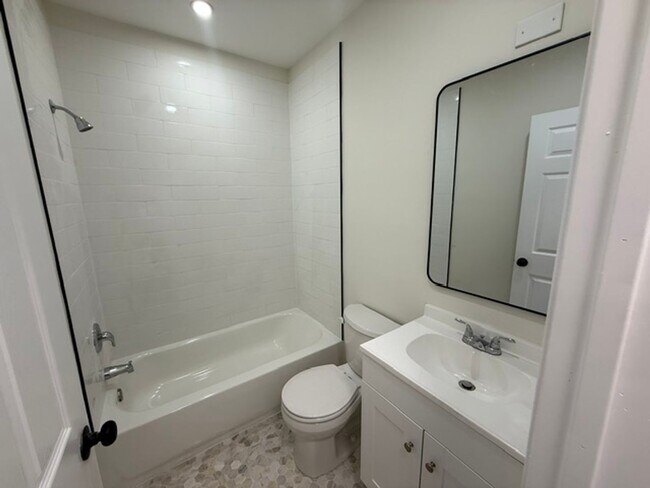 Building Photo - 3-Bedroom Port Richmond Home with Central Air and Expansive Backyard