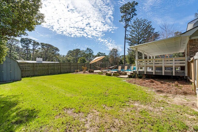 Building Photo - Spacious 4-Bedroom Home with Pool, Two Pri...