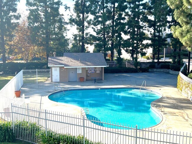 Building Photo - 2-Bedroom, 2-Bath Upstairs Condo Unit in Gated Pomona Community, Water/Trash/HOA Included!
