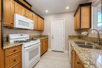 Building Photo - Three bedroom two bath home- fenced yard! - Castle Park