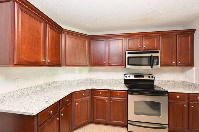 Building Photo - **BEAUTIFUL, WELL-MAINTAINED BRICK HOME ON A LOVELY 0.63-ACRE LOT IN A DESIRABLE NEIGHBORHOOD**