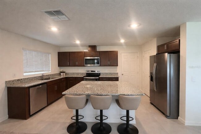 Building Photo - 8328 Wilder Pnes Ave