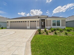 Building Photo - Furnished 3/2 in Water’s Edge | Golf Cart ...