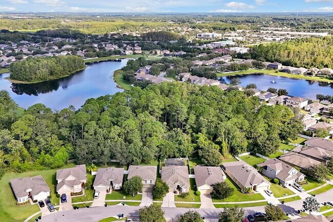 Building Photo - "Stunning 3BR Orlando Home with Private Screened Pool, Spa & Spacious Living Areas"