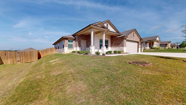 Building Photo - Discover this spacious 4-bedroom, 2-bath home with 3 CAR GARAGE!!!