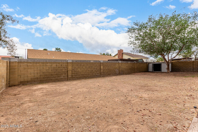 Building Photo - 421 E San Angelo Ave