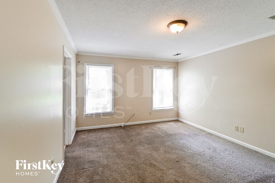 Building Photo - 8441 Woolrich Dr