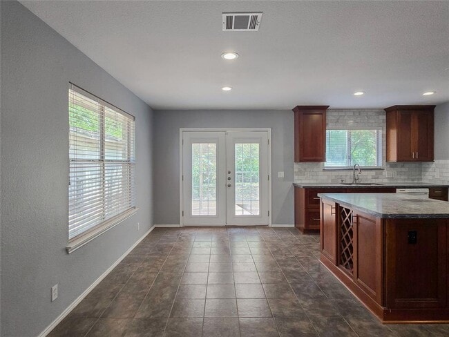 Building Photo - 9511 Woodvale Dr