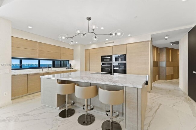 Building Photo - 18555 Collins Ave