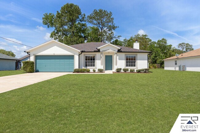 Building Photo - FULLY FENCED 3/2/2 IN THE HEART OF PALM COAST