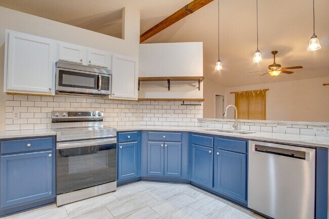 Building Photo - Energy-Efficient 3BR/2BA Solar Home in Pace with Screened Porch, Fenced Backyard, Updated Kitchen...