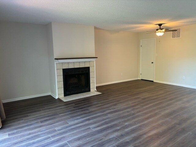 Spacious living / dining area with wood fireplace, brand new floor. - 3913 Whooping Crane Cir