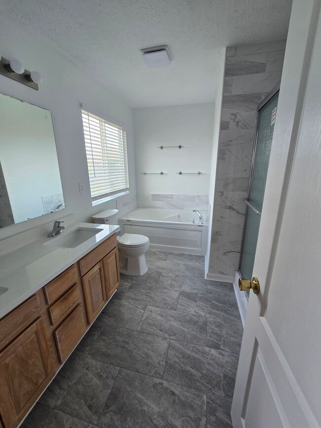 Building Photo - Newly Updated Four Bedroom Home located near German Church Rd and E 52nd Street