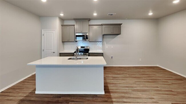 Building Photo - LUXURY 3 Bedroom 2 Bathroom Townhome in Piedmont Schools (Neighborhood Park and Basketball Court)