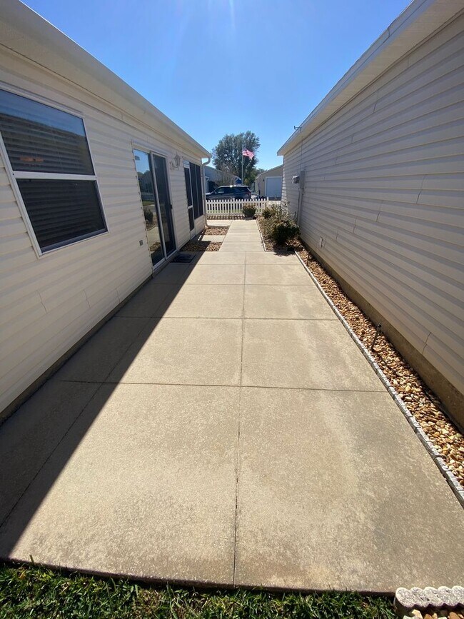 Building Photo - Charming Just Renovated Unfurnished ANNUAL LEASE - 2 Bedroom 2 Bath Patio Villa - Located In The ...