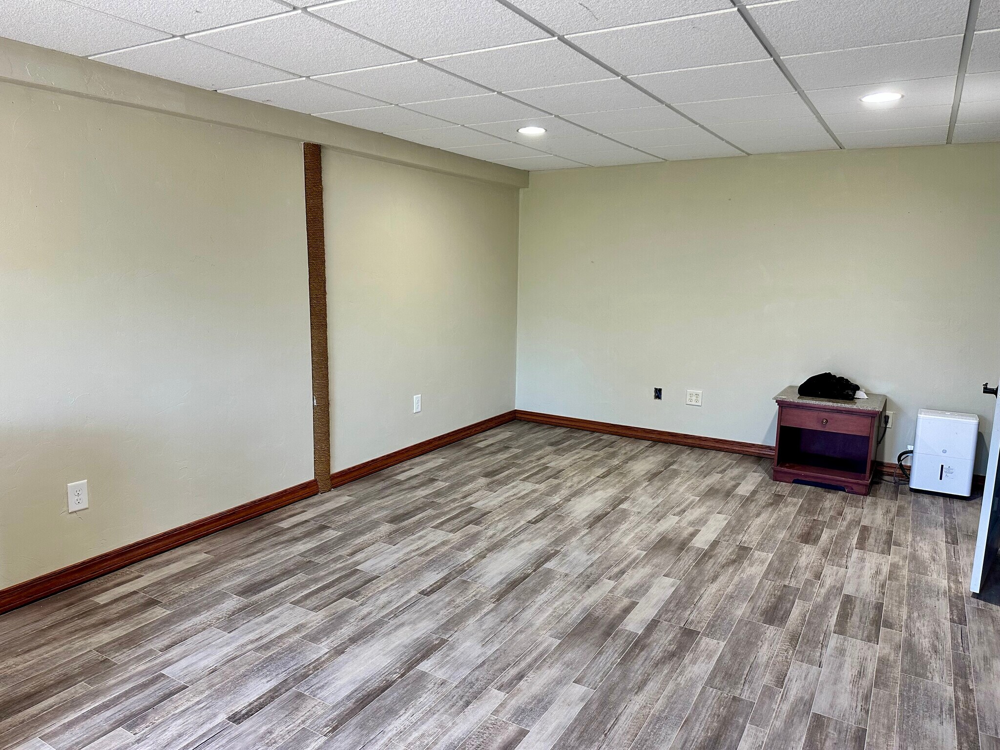 Lower living room or third bedroom - 7166 Sundew Rd