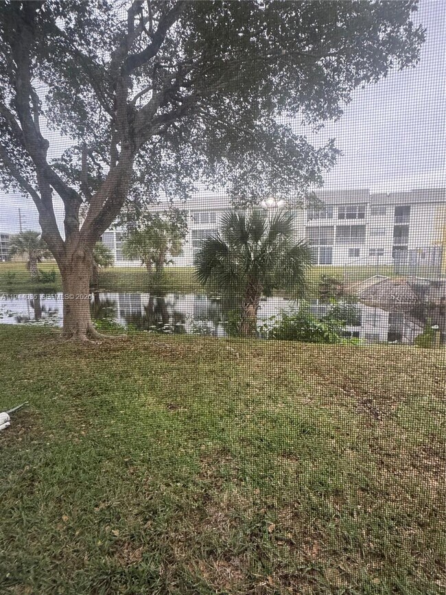 Building Photo - 8590 Sunrise Lakes Blvd