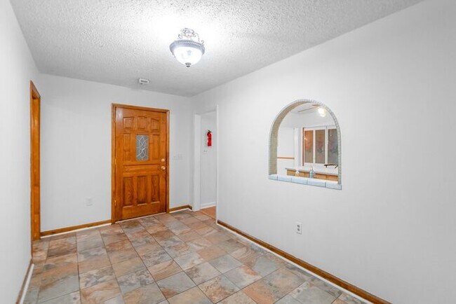 Building Photo - Space to Live, Room to Dream, 4BR/2BA with flex space, office, 2 car dettached garage and ample p...