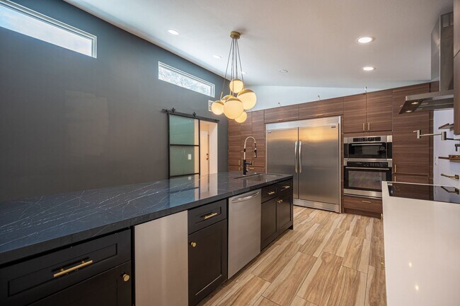 Building Photo - European-inspired Mid-Century Henderson Home!