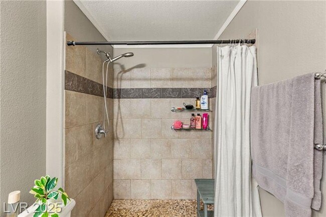 Building Photo - Spacious Two-Bedroom Condo with Resort-Sty...