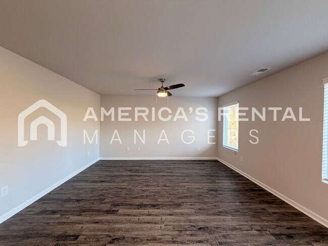 Building Photo - Spacious Two-Story Townhome with Open Layout!