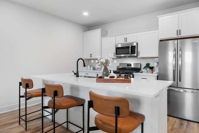 Building Photo - Brand New Three Bedroom Townhome in West L...