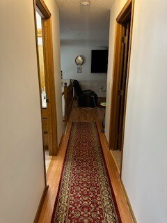 Hallway to upper level rooms - 19158 Yale St NW