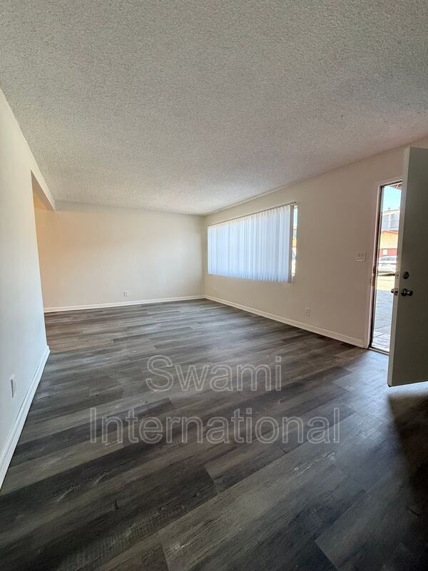 Building Photo - 13448 1/2-13612-22 Doty Ave