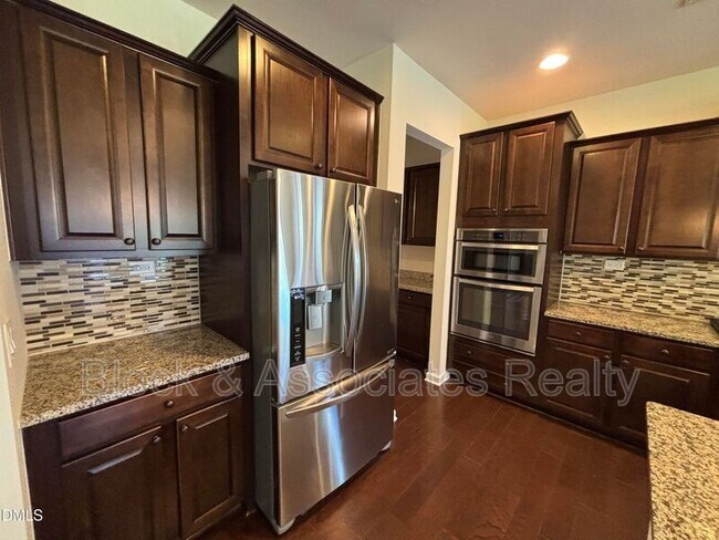 Building Photo - 1009 Magnolia Blossom Ln