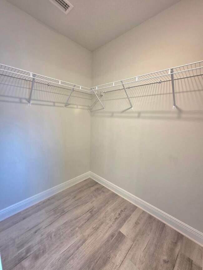 Building Photo - Bright, Open Layout | Screened Porch + Paver Patio | Move-In Ready