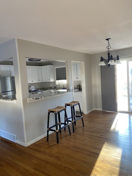 New kitchen with bar top space - 5716 N Denver Ave