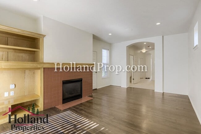 Building Photo - Charming 3-Bedroom Home with Wood Floors, Gas Fireplace & Private Patio