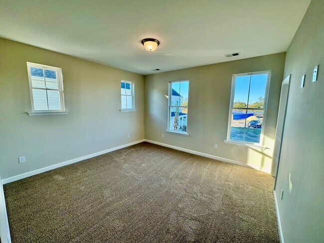 Building Photo - Discover Coastal Living at Its Finest in Marketview, Market Common – Now Leasing!