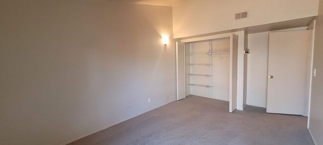 Building Photo - Two-Bedroom Condo| Parking + WiFi Included!