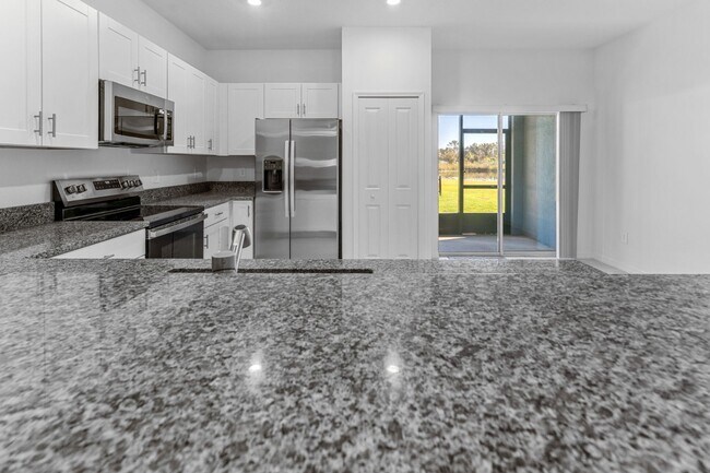 Building Photo - Luxury 3 BR + LOFT/2.5BA/1 Car Garage Luxury Townhome in the highly desirable GATED community of ...