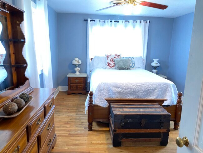 One of four bedrooms. - 710 N Main St