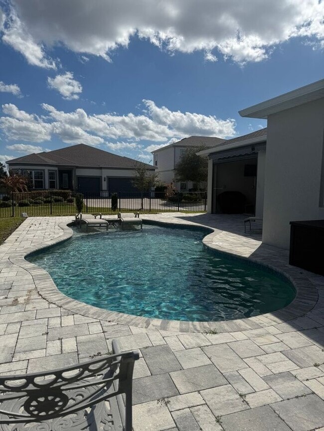 Building Photo - ISLES OF LAKE NONA POOL HOME!!