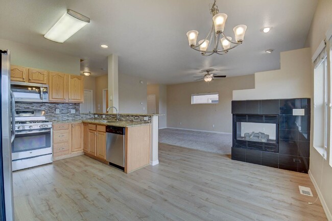 Building Photo - Updated Townhome Near Fort Carson with Unm...