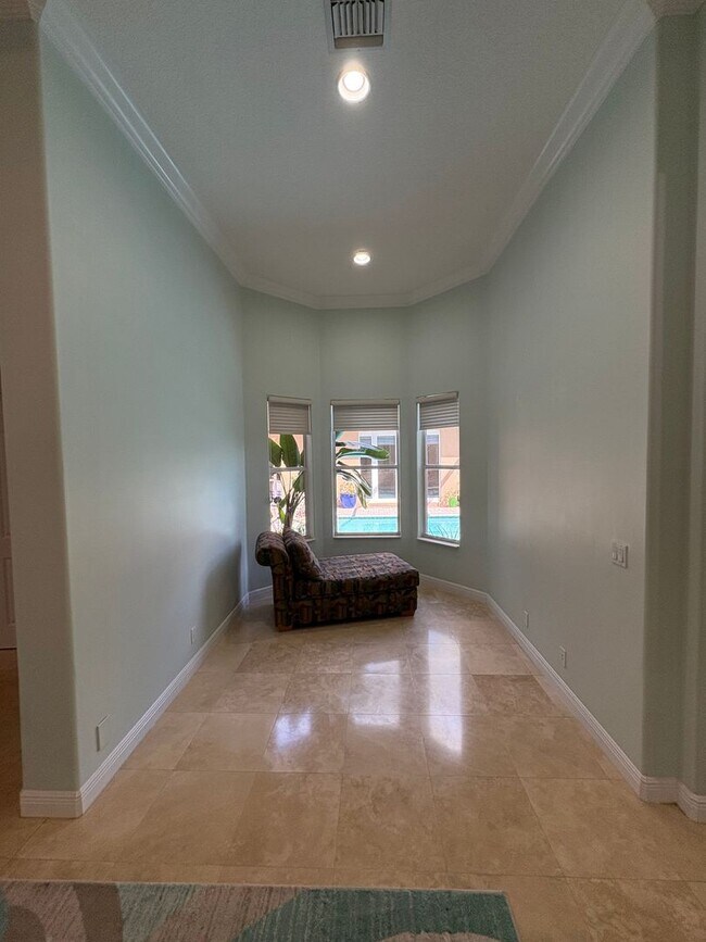 Building Photo - Spacious 3/3.5 3 car garage home in Palm City
