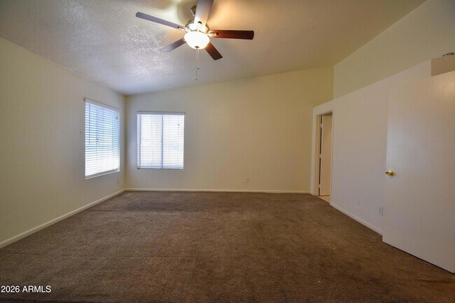 Building Photo - 5570 W Becker Ln