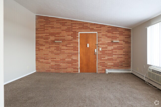1BR, 1BA - 700SF - Living Room - Pinecrest Apartments