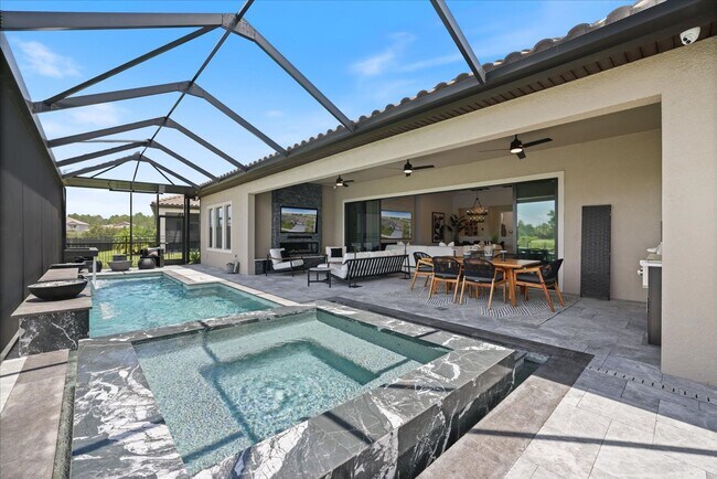 Building Photo - Luxury Home w/ Pool, Outdoor Kitchen, Car Lift, & Water View In Parrish!